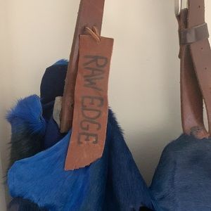 RAW EDGE Collection Designer Gloria A. Bradley Blue Gazelle & 100% leather.